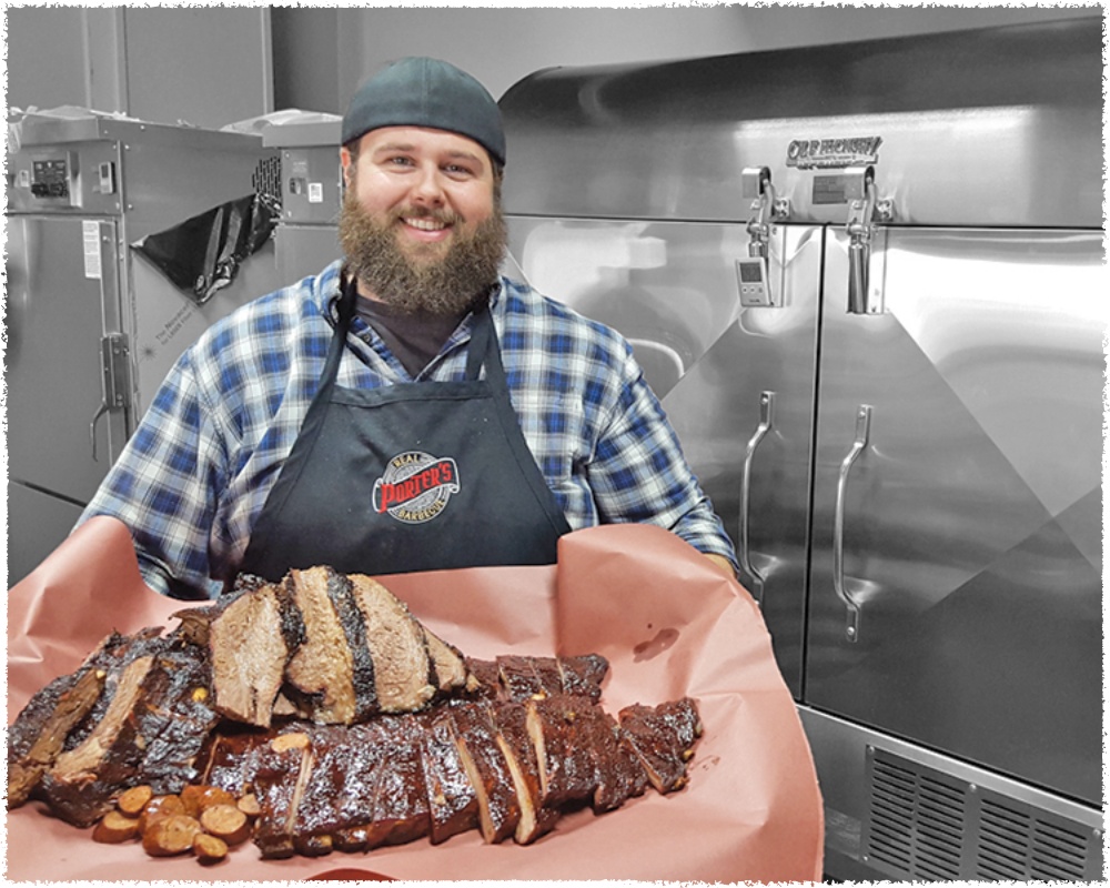 Porter with tray of meats
