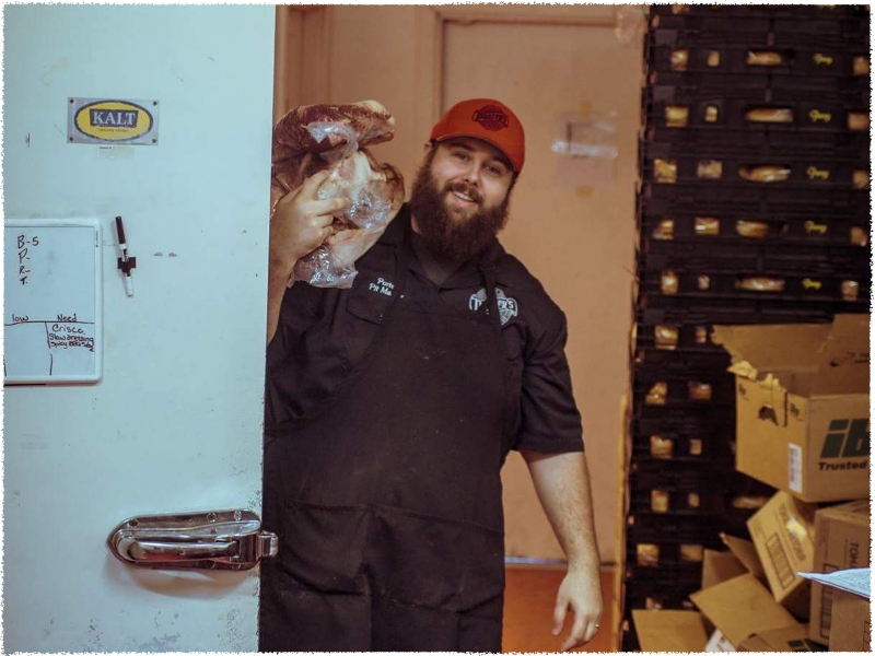 Porter carrying meat
